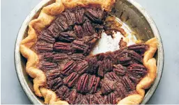  ?? RYAN LIEBE/NEW YORK TIMES ?? Maple-honey pecan pie: The more nuts you can fit into your pie pan, covered with the least amount of goo to hold them in place, the better the pie.