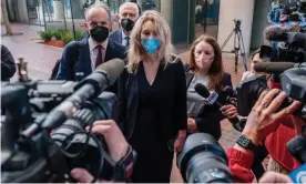  ??  ?? Elizabeth Holmes, the founder and former CEO of Theranos, arrives at a federal court in San Jose, California on 31 August. Photograph: Nick Otto/AFP/Getty Images