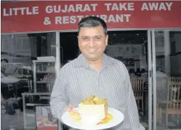  ??  ?? Hitesh Bhatt says their shop, Little Gujarat, makes about 200 bunny chows a day.