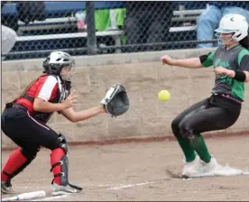  ?? MIKE BUSH/NEWS-SENTINEL ?? Lodi catcher Allisa Yabumoto gets ready to tag out St. Mary's runner Abigail Parises in Wednesday's TCAL softball game at Arnaiz Softball Complex.