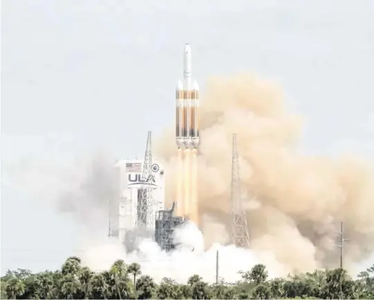  ?? ULA via TNS ?? The final United Launch Alliance Delta IV Heavy rocket launches from Cape Canaveral Space Force Station’s Space Launch Complex 37 on Tuesday.