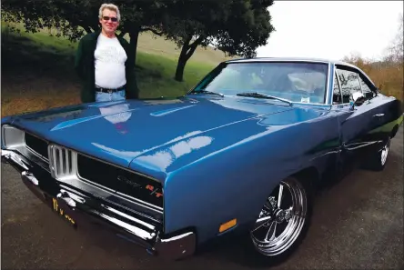  ?? PHOTO BY DAVID KRUMBOLTZ ?? Don Upchurch of Hayward stands next to his 1969 Dodge Charger R/T. He has owned the car since 1976.