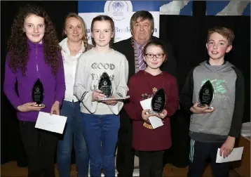  ??  ?? Caim NS team: Rose Phylan, Ava Brady, Maeve McCarty and Jason Sheridan, winners in Under 13 section with Suzanne Brady (teacher) and Pat O’Shea (chairman).