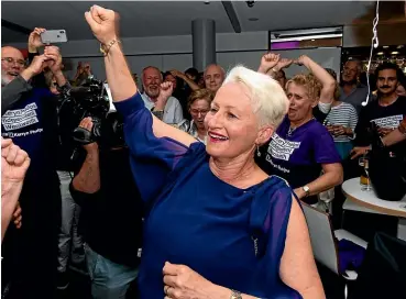  ?? FAIRFAX ?? Kerryn Phelps, Independen­t candidate for the seat of Wentworth, celebrates her win with her supporters at North Bondi SLSC on Saturday night.