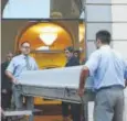  ?? Manu Fernandez, The Associated Press ?? Workers bring a casket to the Dali Theater Museum on Thursday in Figueres, Spain.