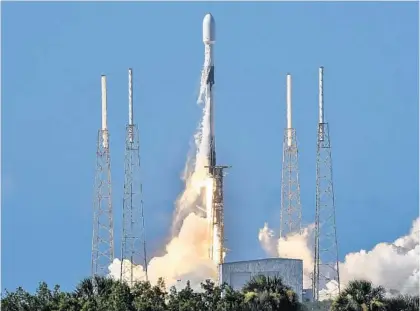  ?? CRAIG BAILEY/AP ?? A SpaceX Falcon 9 lifts off Monday from Cape Canaveral Air Force Station. The rocket is carrying a national security satellite for South Korea.