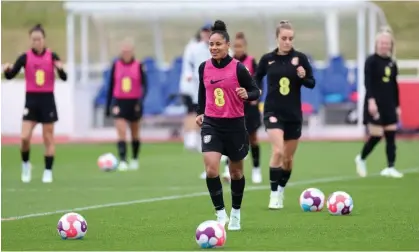  ?? Photograph: Carl Recine/Action Images/Reuters ?? Nikita Parris, centre, in training with her England women’s football teammates at St George's Park in Burton upon Trent on Sunday.