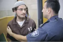  ?? ARIEL SCHALIT/THE ASSOCIATED PRESS ?? Israel said Tuesday it was interrogat­ing Meir Ettinger, the suspected head of a Jewish extremist group.