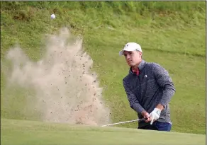  ?? Associated Press ?? Out of the dirt: Jordan Spieth of the United States plays out of a bunker on the 17th hole during the third round of the British Open Golf Championsh­ip, at Royal Birkdale, Southport, England, Saturday.