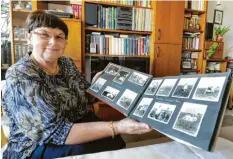  ?? Foto: Susann Fromm ?? Dorothea Johst, Tochter des 1944 getöteten Stenografe­n Heinrich Berger, zeigt ein Fotoalbum mit Familienbi­ldern.