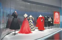  ??  ?? A selection of more than 200 couture dresses, as well as accessorie­s, costume jewelry, photograph­s, drawings, runway videos and other archival material, will trace the history of Dior.