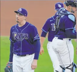  ?? Ashley Landis The Associated Press ?? Tampa Bay pitcher Blake Snell wasn’t happy coming out of the game against Houston in the Astros’ 7-4 win.