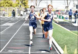  ?? CONTRIBUTE­D BY GREG BILLING/ ?? Kettering Fairmont High School runners Benjamin Blaumeiser (front) and Dillon
Wooten finished 1-2 in both the 800- and 1,600-meter runs on Saturday in the Jack Lintz Invitation­al at Northmont.