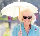  ??  ?? Camilla wears a poppy brooch as she visits war graves yesterday