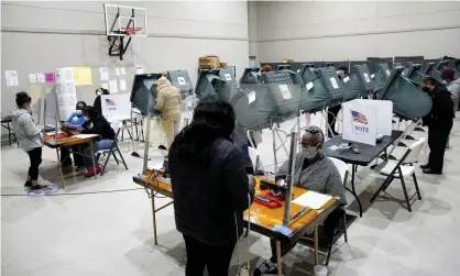  ?? Photograph: Elizabeth Conley/AP ?? Voters cast ballots in Houston, Texas, in October 2020.