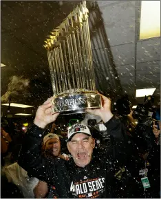  ??  ?? In this 2014 file photo, San Francisco Giants manager Bruce Bochy celebrates after Game 7 of baseball’s World Series against the Kansas City Royals, in Kansas City, Mo. aP PHoTo/DaVID J. PHIllIP