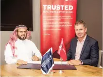  ??  ?? Ibrahim Al-Ghemlas, director of Community Services and Continuing Education Center at Prince Sultan University, left, and Lee Miles, regional manager, CEMEA at Red Hat, during the signing ceremony for an employment program.