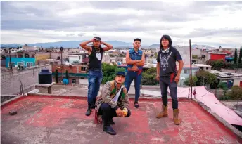  ?? — AFP photos ?? Members of Mexican rock band Los Cogelones, the Sandoval Garcia brothers (from left to right) Beto, Victor, Gabriel and Marco pose for a photograph in Ciudad Nezahualco­yotl, Mexico state.