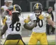  ?? PHELANM. EBENHACK - THE ASSOCIATED PRESS ?? Pittsburgh Steelers linebacker Bud Dupree (48) and linebacker T.J. Watt, right, celebrate a big play against the Jacksonvil­le Jaguars during the second half of an NFL football game, Sunday, Nov. 22, 2020, in Jacksonvil­le, Fla.