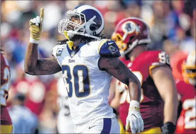  ?? AP PHOTO ?? Los Angeles Rams running back Todd Gurley celebrates after scoring against the Washington Redskins during an NFL football game Sunday in Los Angeles.