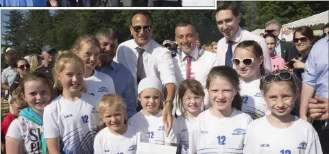  ??  ?? Minister Andrew Doyle, Taoiseach Leo Varadkar, Cllr Shay Cullen and Minister Simon Harris with members of Roundwood Community Games and their cheque from Wicklow Municipal District.