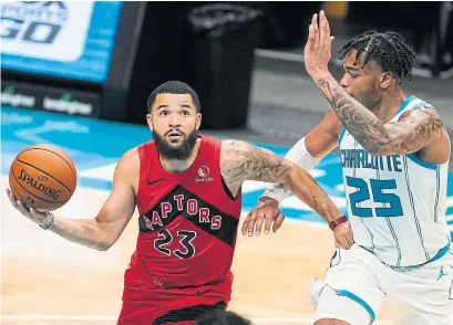  ?? CHRIS CARLSON THE ASSOCIATED PRESS ?? Raptors guard Fred VanVleet drives by Charlotte Hornets forward PJ Washington during what turned out to be an easy Toronto win.