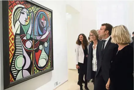  ??  ?? France’s President Emmanuel Macron visits the Picasso 1932: Erotic Year exhibition at the Picasso museum in Paris last Sunday. — Photos: Reuters