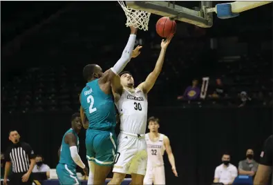  ?? Photo by Steve Simoneau / Coastal Carolina University Athletics ?? Bryant junior guard Chris Childs (30) scored a team-high 24 points, but the Bulldogs never found their footing in Monday’s 93-82 defeat to Coastal Carolina in the first round of the College Basketball Invitation­al.