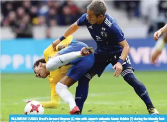  ??  ?? VILLENEUVE D’ASCQ: Brazil’s forward Neymar (L) vies with Japan’s defender Atsuto Uchida (R) during the friendly football match between Japan and Brazil at the Pierre Mauroy Stadium in Villeneuve d’Ascq, northern France. — AFP