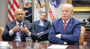  ?? AP FILE PHOTO ?? U.S. President Donald Trump listens as Indiana Attorney General Curtis Hill speaks during a meeting with state and local officials to discuss school safety in the Roosevelt Room of the White House in Washington.