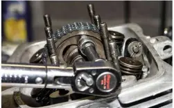  ??  ?? Always use a torque wrench to tighten engine bolts.