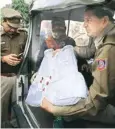  ?? PIC/NAVEEN SHARMA ?? Accused Tanveer in police custody, along with his bullet-proof jacket