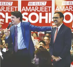  ?? ED KAISER ?? Prime Minister Justin Trudeau speaks to volunteers and supporters of Natural Resources Minister Amarjeet Sohi in Edmonton Thursday. Outside, protesters heckled Liberal supporters.