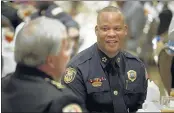  ?? BRANDON DILL/SPECIAL TO THE COMMERCIAL APPEAL ?? Memphis Police Director Toney Armstrong (right) talks with Shelby County Sheriff Bill Oldham during the MPD and SCSO 2014 awards ceremony Thursday. Armstrong later commented on his plans to retire in 2017.