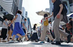  ?? AP ?? If Japan wants to push up inflation, it certainly needs spending to be higher. —