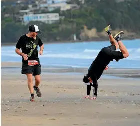  ??  ?? Doing cartwheels epitomises what running marathons is about – sure, they’re a challenge but they’re best done when you’re having fun.