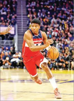  ?? AFP ?? Rui Hachimura of the Washington Wizards dribbles the ball against the Golden State Warriors in the first half at Chase Centre on Monday.