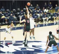  ?? David Butler II / USA Today ?? UConn’s Isaiah Whaley (5) tips off against Hartford’s Thomas Webley (15) on Nov. 27.