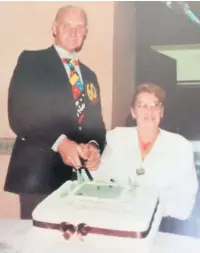  ??  ?? Donald Mackay celebratin­g a birthday at the club with his late wife Eunice