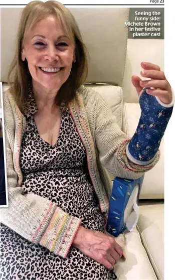  ??  ?? Seeing the funny side: Michele Brown in her festive plaster cast