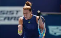  ?? The Associated Press ?? ■ Maria Sakkari, of Greece, reacts after winning a point against Naomi Osaka, of Japan, during Wednesday’s quarterfin­als of the Miami Open in Miami Gardens, Fla. Sakkari won 6-0, 6-4.