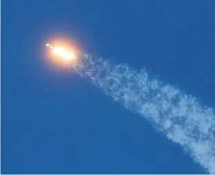  ?? REUTERS ?? A SpaceX Falcon 9 rocket lifts off from pad 39A with the seventh batch of SpaceX broadband network satellites, at the Kennedy Space Center, in Cape Canaveral, Fla. in this April 22, 2020 file photo.