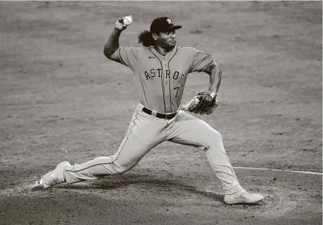  ?? Photos by Sean M. Haffey / Getty Images ?? Luis Garcia made his major league debut for the Astros on Friday, relieving starting pitcher Lance McCullers Jr. in the first inning.