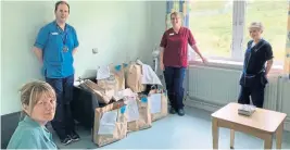  ??  ?? Staff from the acute admissions ward at Perth Royal Infirmary with some of the donations.