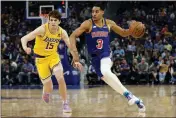  ?? RAY CHAVEZ — BAY AREA NEWS GROUP ?? The Warriors’ Jordan Poole (3) dribbles past Los Angeles Lakers’ Austin Reaves (15) in the first quarter at Chase Center in San Francisco on Thursday.