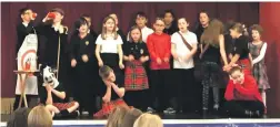  ??  ?? Youngsters from primary 5,6 and 7 of Tobermory Primary School perform their action song.