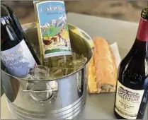  ?? KRISTA SLATER FOR THE ATLANTA JOURNAL-CONSTITUTI­ON ?? Have a wine-and-cheese moment this spring with the lively grapes of the Alps.