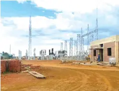  ?? ?? A transmissi­on tower is installed at the 25MW Centragrid PV solar expansion project in Nyabira as it inches closer to completion and feed 25MW power into the national grid from the current 2,5MW