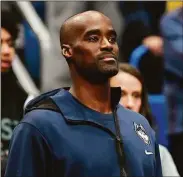  ?? Jessica Hill / Associated Press ?? Former UConn and NBA player Emeka Okafor watches the second half of a game between UConn and Villanova on Wednesday in Hartford.