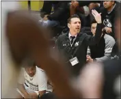  ??  ?? American Canyon head coach Scott Hayburn yells direction during the Wolves’ 73-68 win over Windsor on Tuesday.